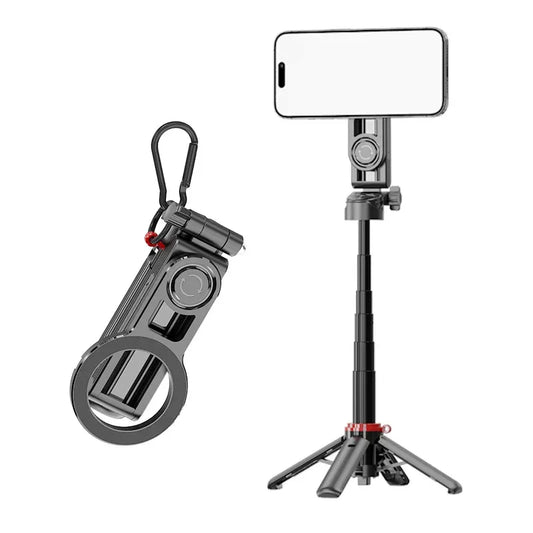 Magnetic telescopic selfie stick folded with lanyard, next to it extended on a tripod holding a phone